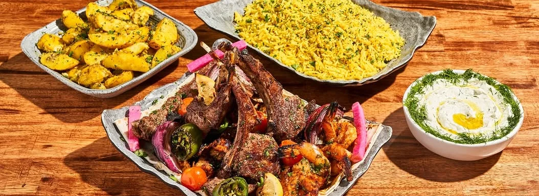 Mediterranean BBQ plated meals with kebab and rice
